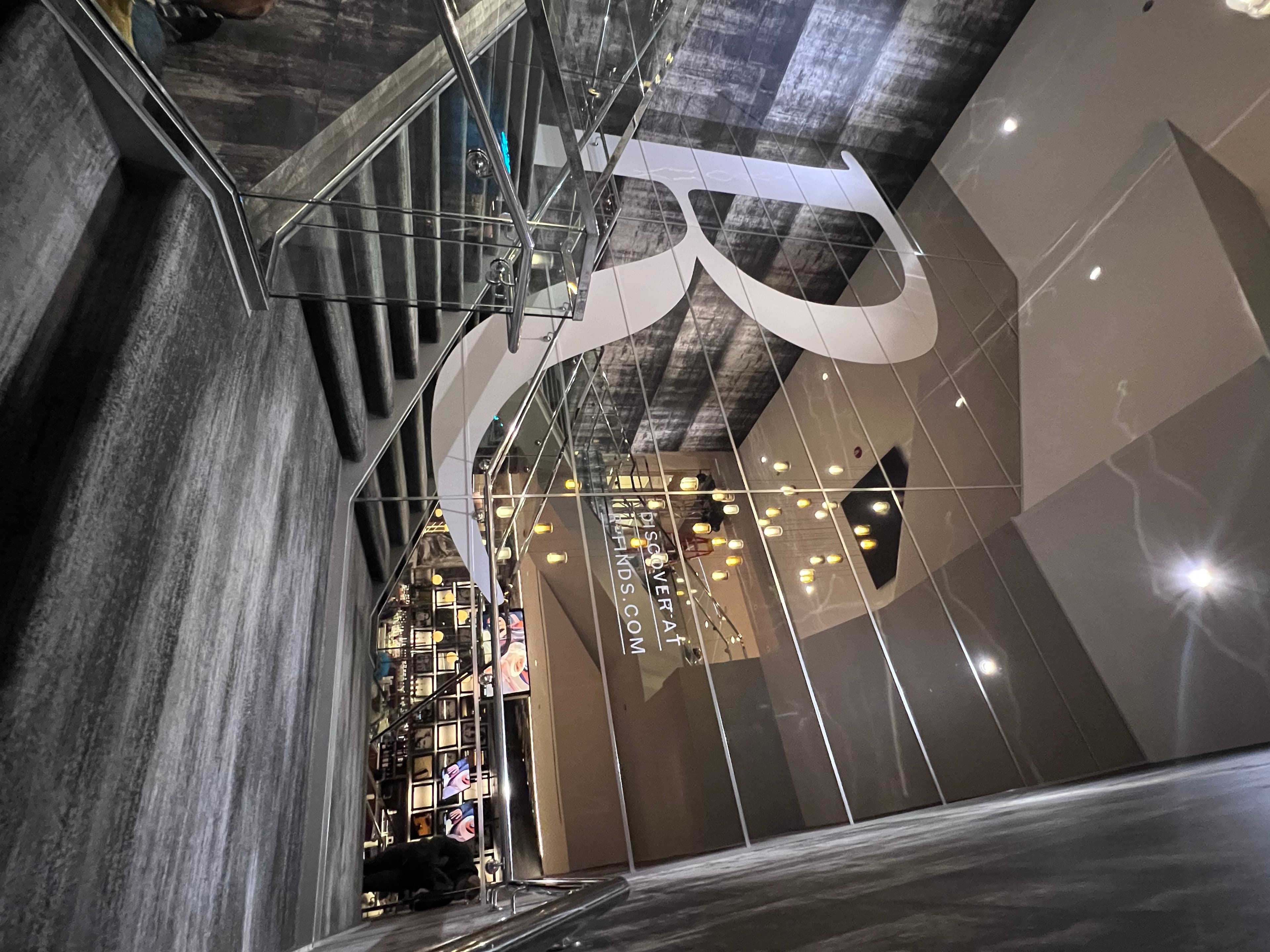 Hotel lobby stairwell – elevated hospitality branding and environmental graphics